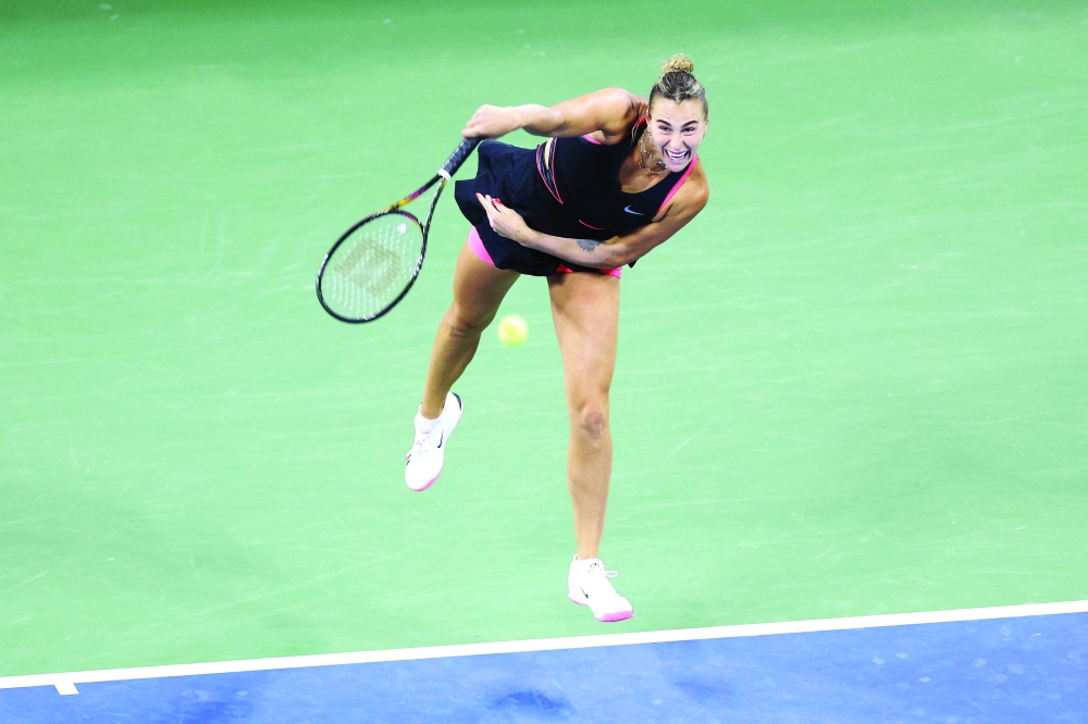 Belarus's Aryna Sabalenka serves to Canada's Leylah Fernandez during their women's singles third round tennis match on day six of the US Open tennis tournament. — AFP