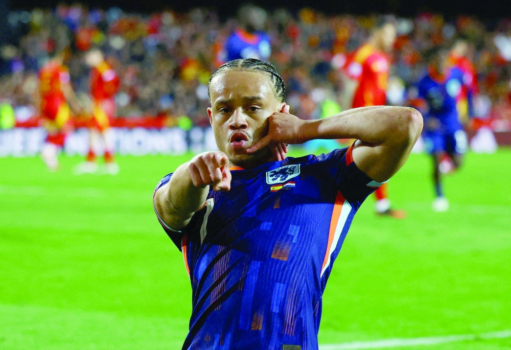 Netherlands' Xavi Simons celebrates scoring their third goal. — Reuters