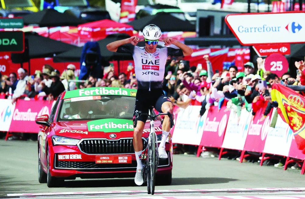 UAE Team Emirates XRG's Juan Ayuso crosses the finish line to win stage 7. — Reuters