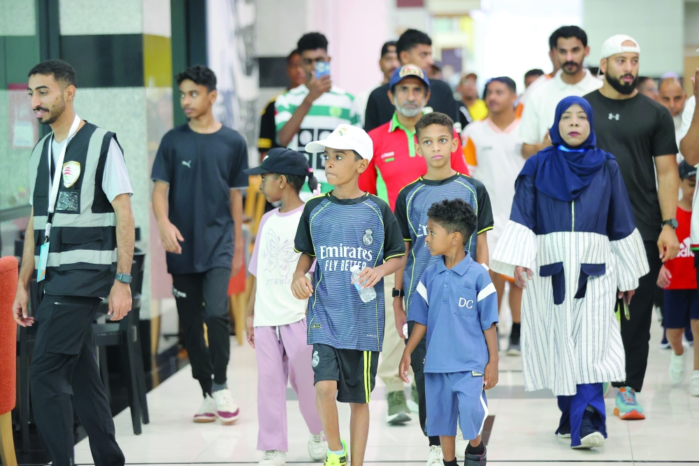 Participation extended beyond individuals, with several institutions, sports clubs and community groups joining. 
- Photo by Hussein Al Muqbali