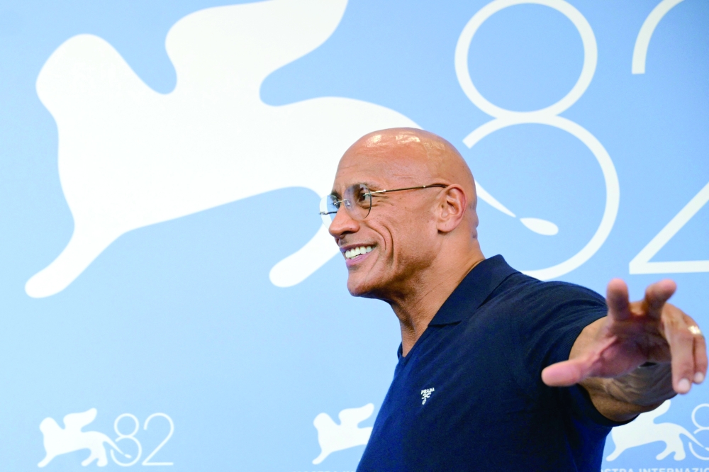 US actor and wrestler Dwayne Johnson attends the photocall of the movie "The Smashing Machine" presented in competition at the 82nd International Venice Film Festival, at Venice Lido on Sepember 1, 2025. 
