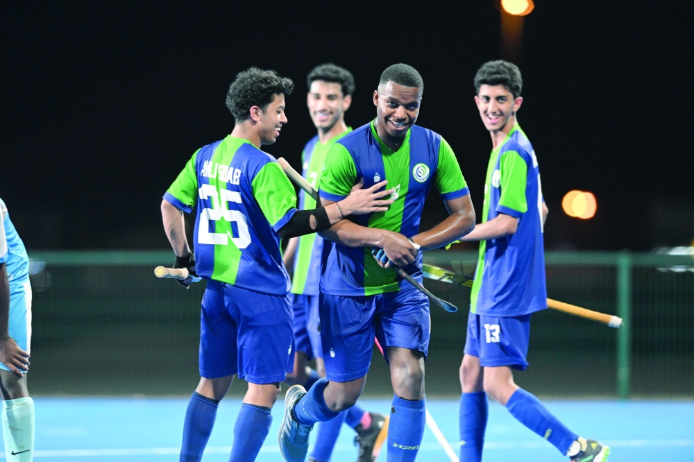 Ahli Sidab players celebrate a goal. — Abdulwahid al Hamadani