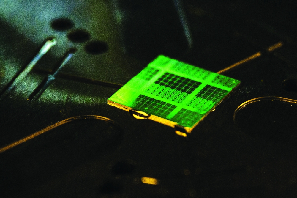 A semiconductor chip diced from a wafer is seen at the Inter-university Semiconductor Research Centre at Seoul National University in Seoul on April 30, 2025. South Korea recorded its highest ever monthly semiconductor exports in August despite growing pressure from US tariffs and other restrictions on the crucial sector, Seoul government data showed on September 1, 2025. (Photo by ANTHONY WALLACE / AFP)