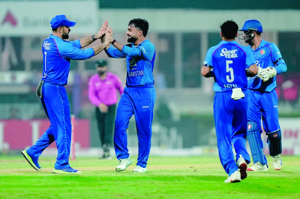 Rashid sets T20I record as Afghanistan beat UAE