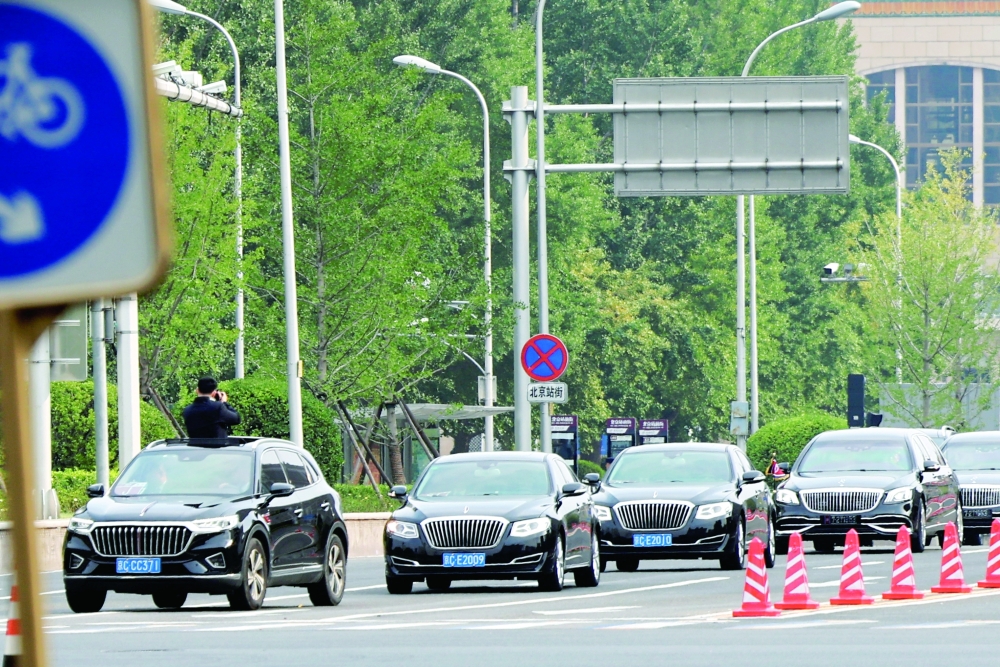 A motorcade believed to be carrying North Korean leader Kim Jong Un leaves Beijing Railway Station. — Reuters