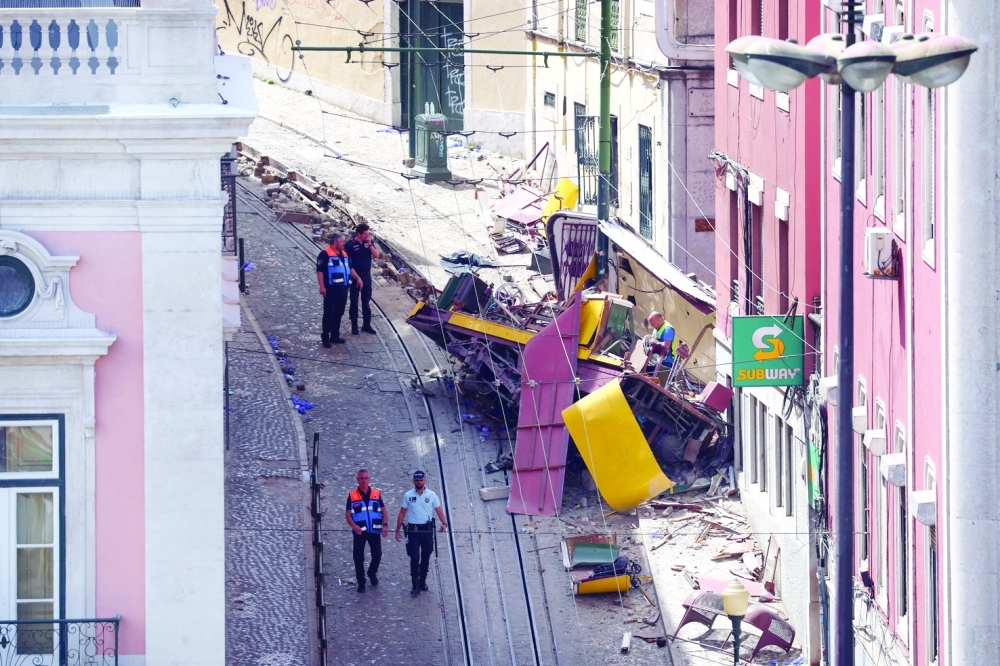 A view shows the site of the accident after Gloria funicular railway car, derailed and crashed, resulting in multiple casualties, in Lisbon, Portugal. - Reuters
