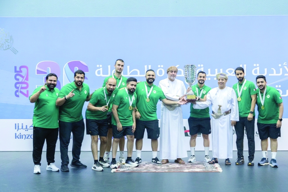 Bahrain Club receive men's champions trophy.