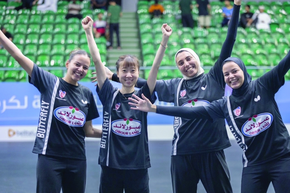 Women's champions Petrojet celebrate their title.