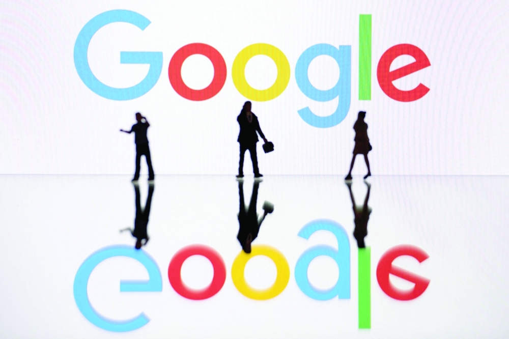 This illustration photograph taken on October 30, 2023, in Mulhouse, eastern France, shows figurines next to a screen displaying a logo of Google, a US multinational technology company. A US judge on September 2, 2025 rejected the government's demand that Google sell its Chrome web browser as part of a major antitrust case, but imposed sweeping requirements to restore competition in online search.