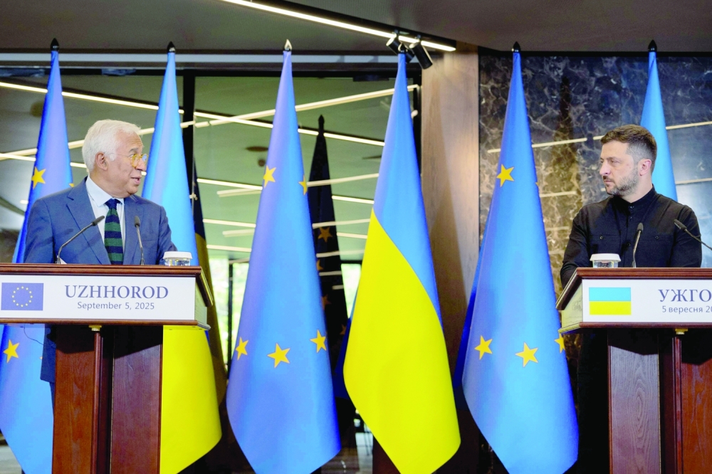 Ukraine's President Volodymyr Zelensky (R) and European Council President Antonio Costa attend a press conference in Uzhhorod. — AFP
