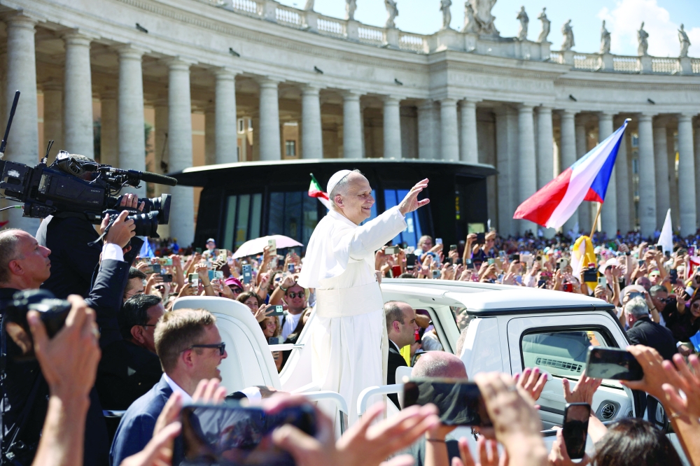 Pope Leo XIV greets the faithful, after a Holy Mass for the canonisation of Carlo Acutis, at the Vatican. — Reuters