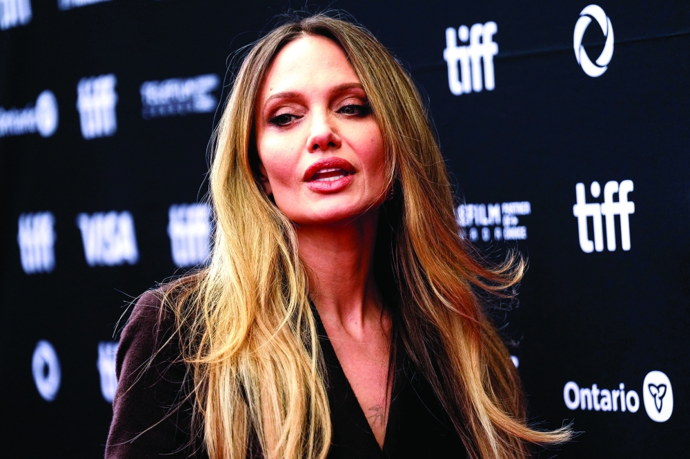 Cast member Angelina Jolie poses during the red carpet for the film "Couture" as the Toronto International Film Festival (TIFF) returns for its 50th edition, in Toronto, Ontario, Canada, September 7, 2025. REUTERS/Mark Blinch