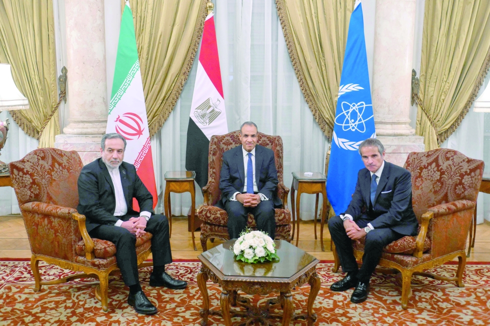 Egypt's FM Badr Abdelatty (C) meets with his Iranian counterpart Abbas Araqchi (L) and Director General of the International Atomic Energy Agency (IAEA) Rafael Grossi in Cair. — AFP
