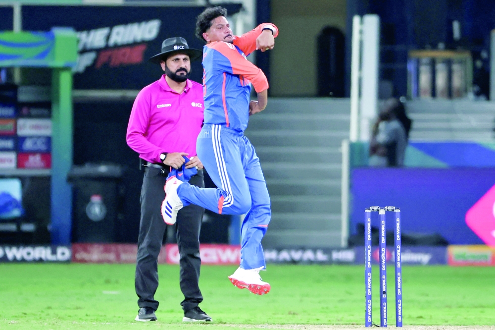 India's Kuldeep Yadav bowls during the Asia Cup 2025 Twenty20 match against United Arab Emirates at the Dubai International Stadium. — AFP
