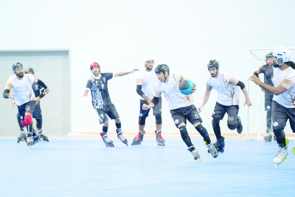 Players fight for the ball during a match at Oman Roll Ball Championship. — Marwan al Yaqoubi