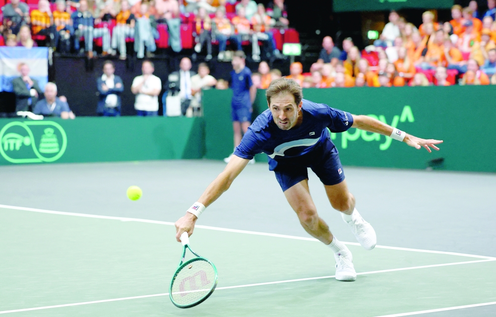 Argentina's Andres Molteni in action during his doubles match with Horacio Zeballos against Netherlands' Botic Van de Zandschulp and Sander Arends. — Reuters