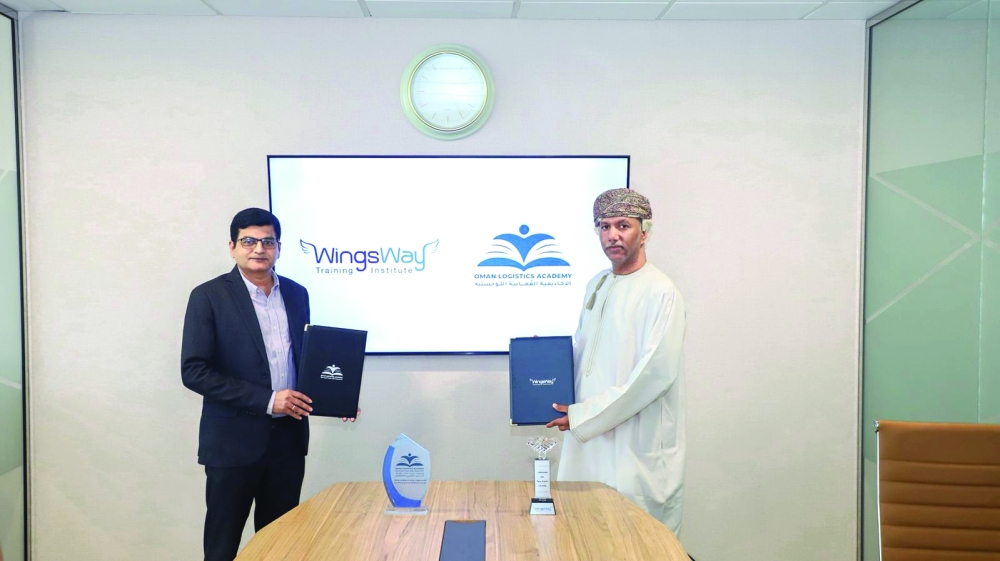Representatives of Oman Logistics Academy and WingsWay at the MoU signing