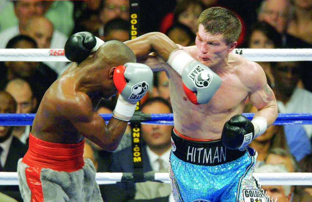 Ricky Hatton in action against Floyd Mayweather. — Reuters