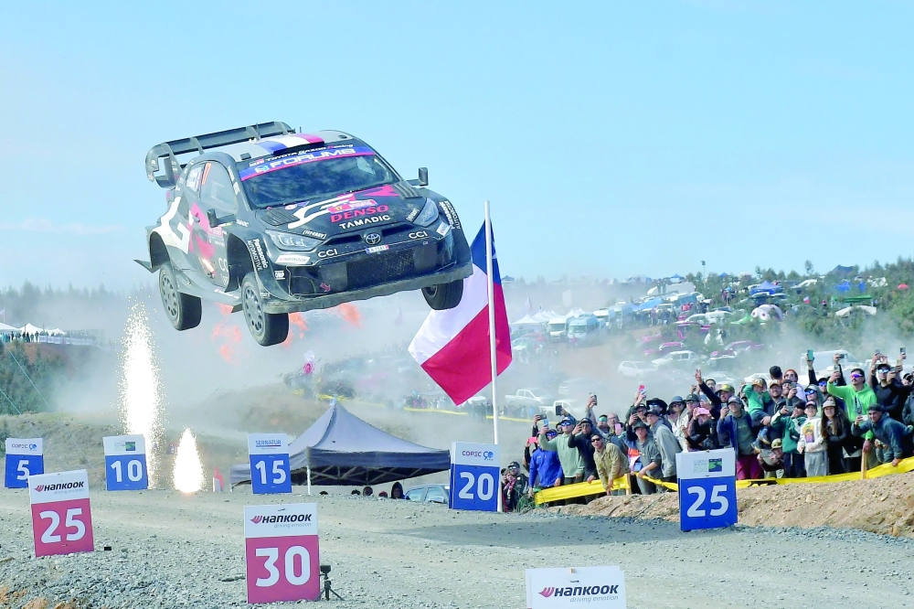 French driver Sebastien Ogier and co-driver Vincent Landais crosses the finish line in their Toyota GR Yaris Rally1 to win the WRC Rally Chile Bio Bio in Concepcion, Chile. — AFP