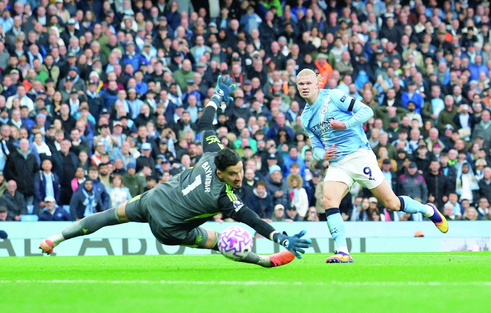 Manchester City's Erling Haaland scores their third goal past Manchester United's Altay Bayindir. — Reuters