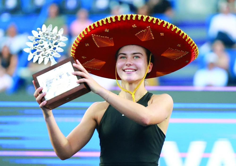Iva Jovic of the US celebrates with the trophy after winning the Guadalajara Open. — Reuters