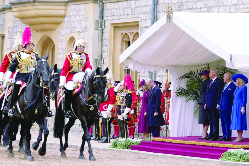US President Donald Trump, Britain's King Charles, Queen Camilla and first lady Melania Trump with Britain's Catherine, Princess of Wales, and Britain's William, Prince of Wales watch soldiers marching past at Windsor Castle. — Reuters