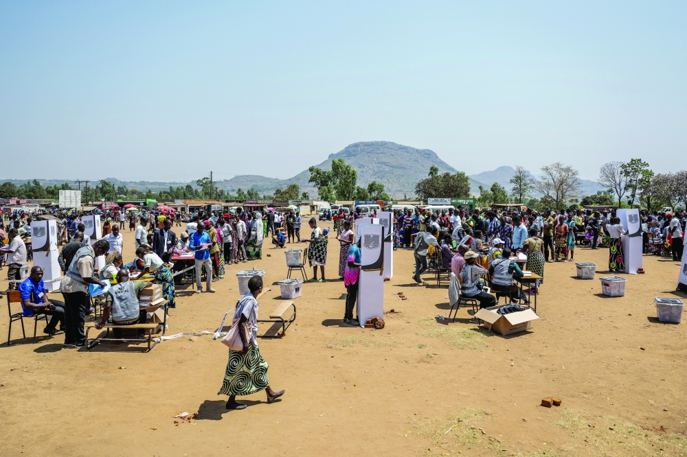 Malawi counts votes in tight presidential race