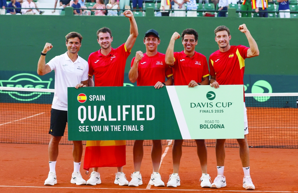 Spain's captain David Ferrer, Pedro Martinez, Roberto Carballes Baena, Jaume Munar and Pablo Carreno-Busta celebrate after their win against Denmark. — Reuters