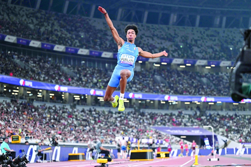 Italy's athlete Mattia Furlani competes in the men's long jump final during the World Athletics Championships in Tokyo on September 17, 2025. (Photo by Kirill KUDRYAVTSEV / AFP)
