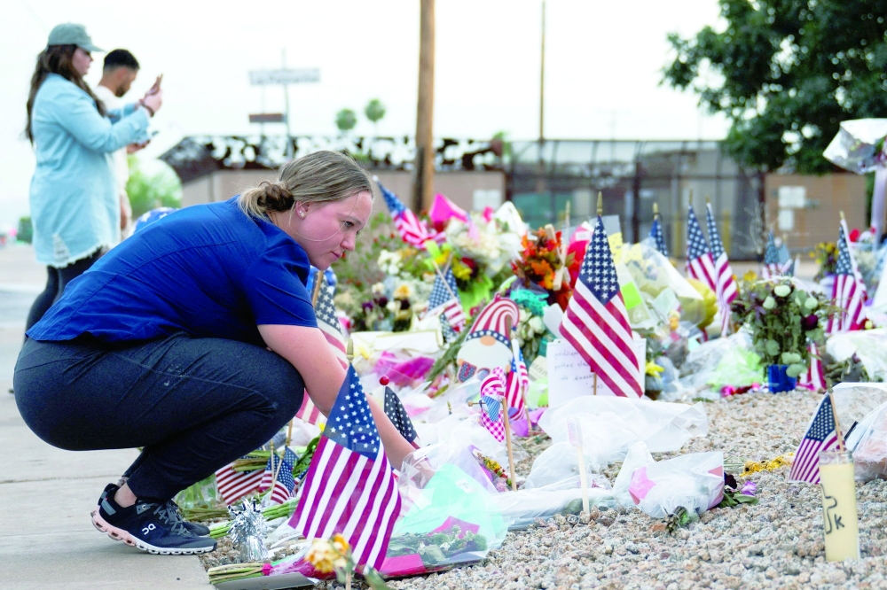 Ashlee Miranda pays tribute to right-wing activist Charlie Kirk, who was fatally shot during an event at Utah Valley University, outside Hansen Mortuary where his body lays, in Phoenix, Arizona. - Reuters 