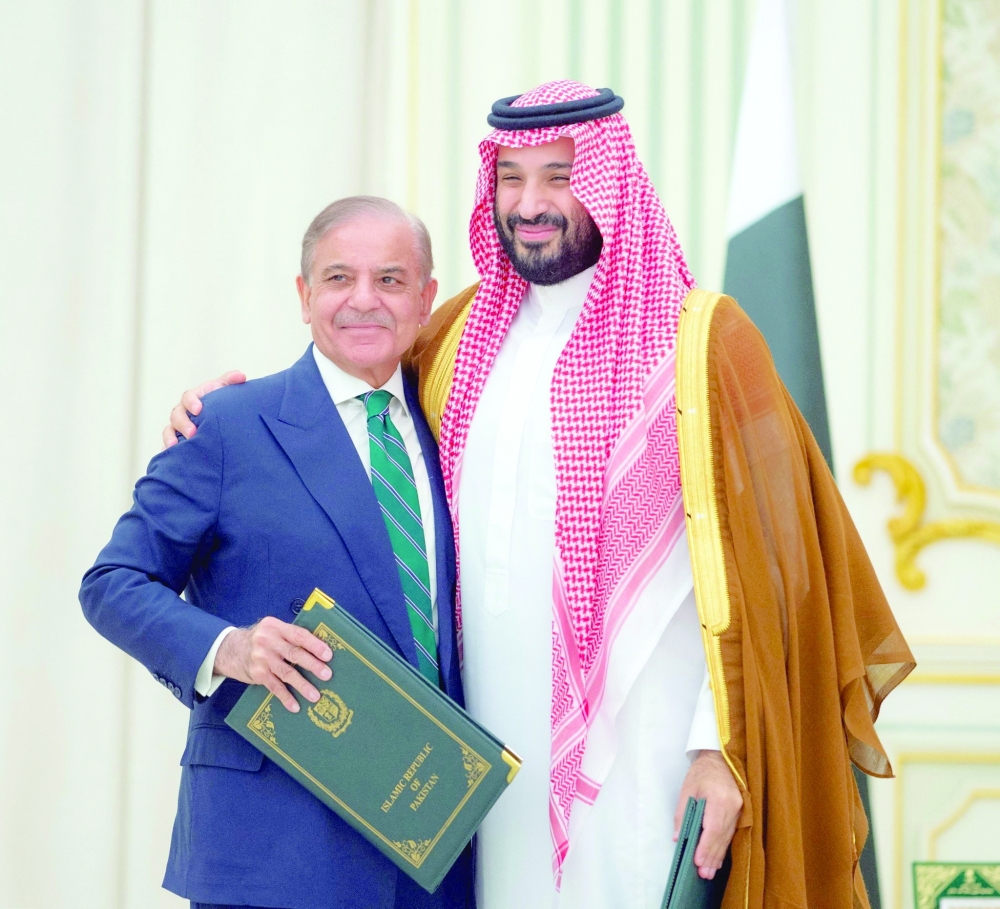 Saudi Crown Prince Mohammed bin Salman and Pakistan Prime Minister Shehbaz Sharif sign a defence agreement in Riyadh.