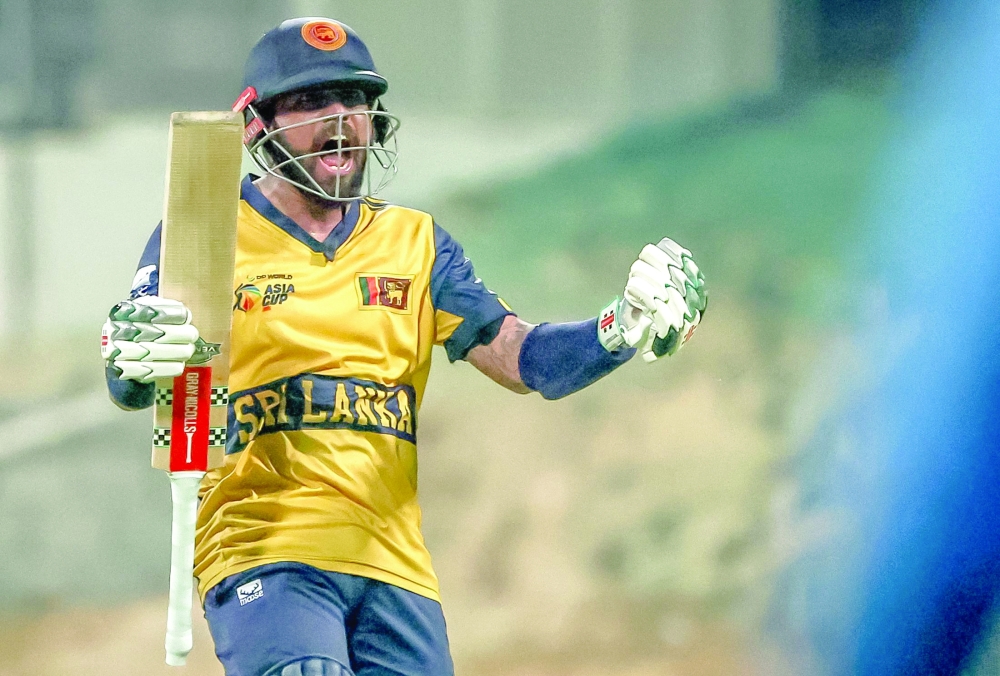 Sri Lanka's Kusal Mendis celebrates his team's win in the Asia Cup 2025 Twenty20 match against Afghanistan at the Sheikh Zayed Cricket Stadium in Abu Dhabi. — AFP
