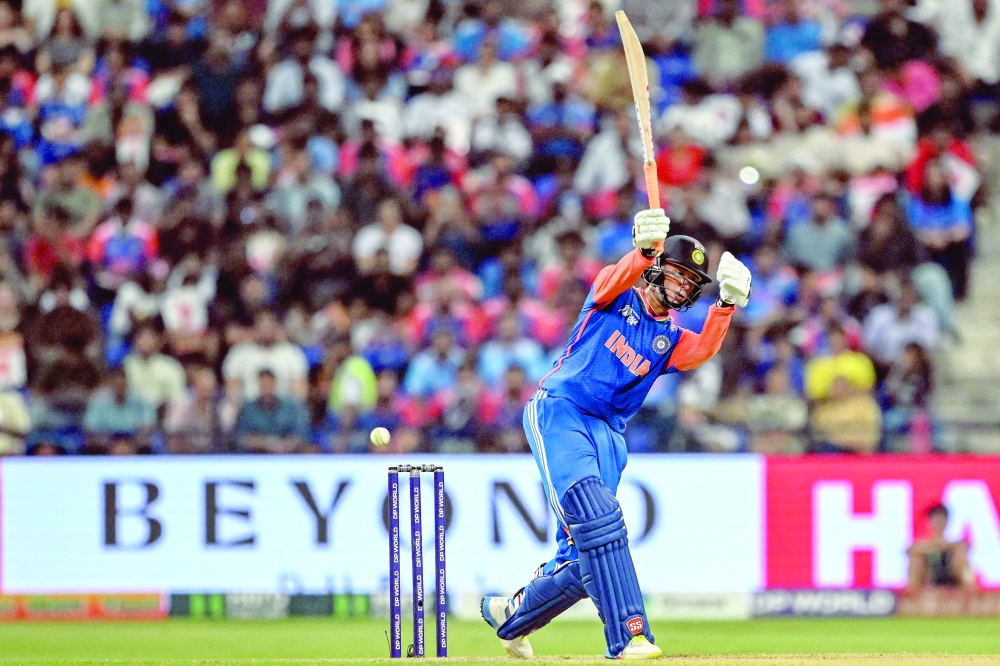 India's Abhishek Sharma plays a shot during the Asia Cup 2025 Twenty20 international cricket match between India and Oman at the Sheikh Zayed Cricket Stadium in Abu Dhabi. — AFP