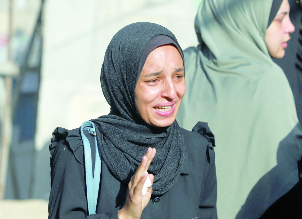 A mourner reacts during the funeral of Palestinians killed in an Israeli strike on a tent in Gaza City on Saturday. — Reuters