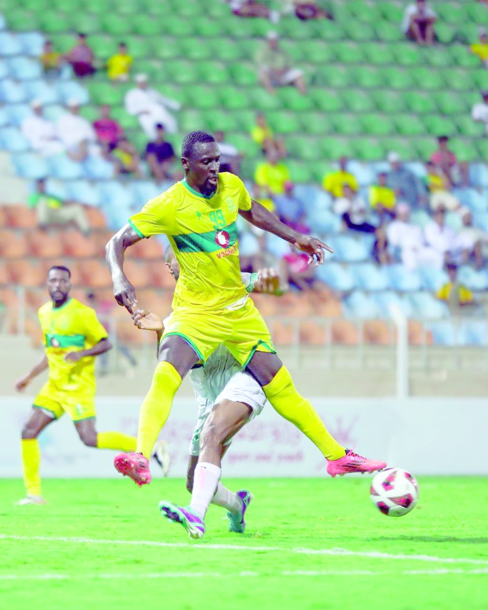 Seeb and Samayil player fight for the ball