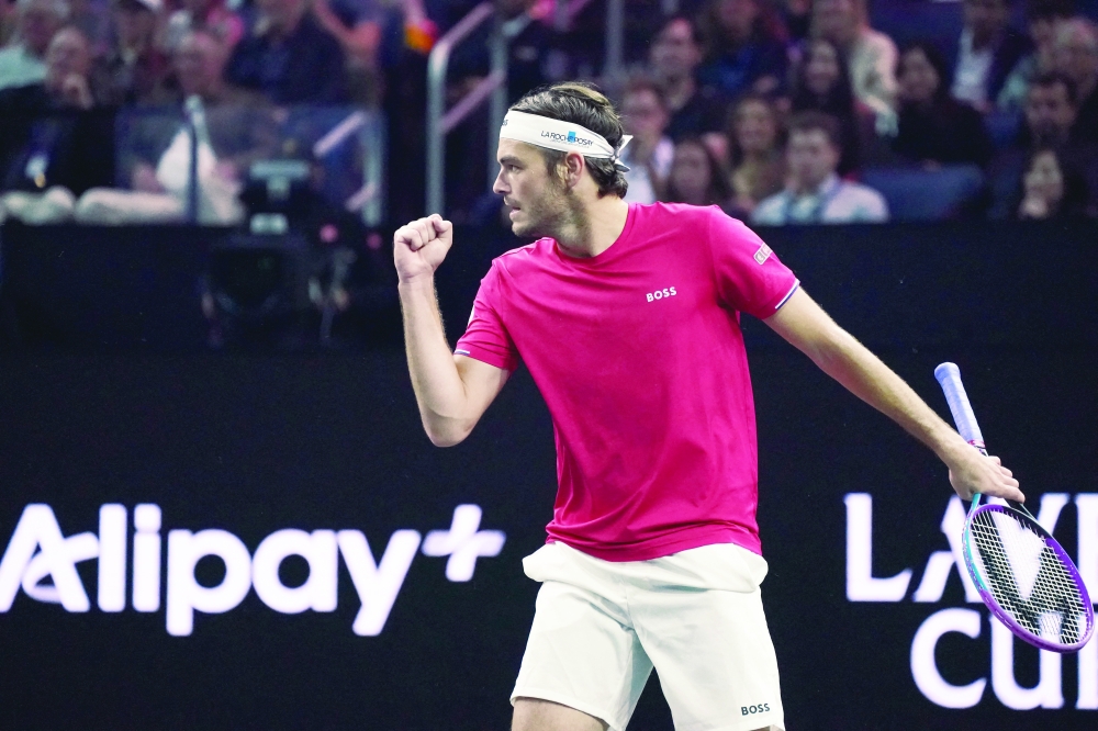 Team World player Taylor Fritz celebrates after winning a point against Team Europe player Carlos Alcaraz at the Laver Cup at Chase Center. —Imagn Images
