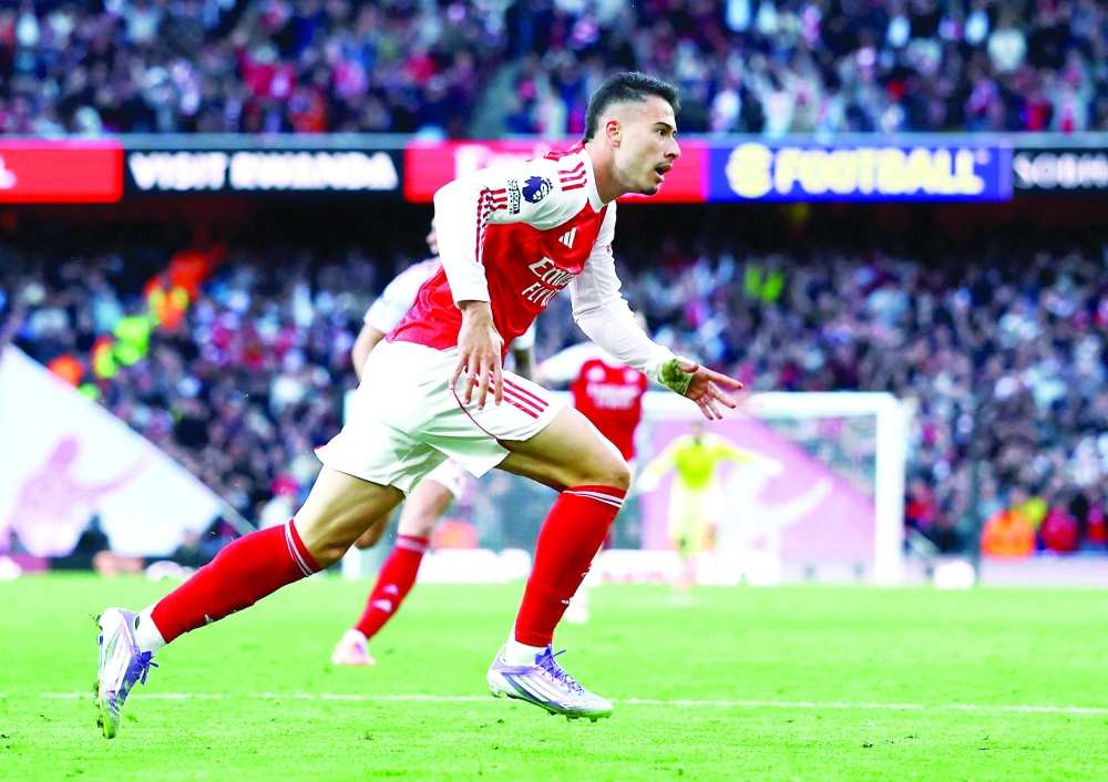 Soccer Football - Premier League - Arsenal v Manchester City - Emirates Stadium, London, Britain - September 21, 2025 Arsenal's Gabriel Martinelli celebrates scoring their first goal Action Images via Reuters