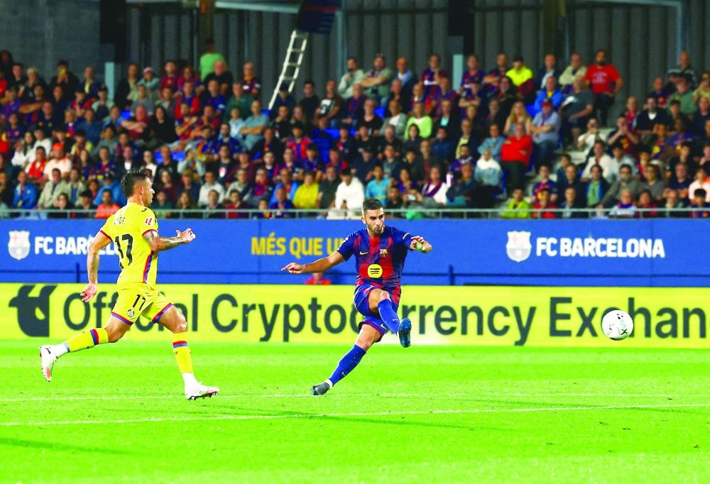 FC Barcelona's Ferran Torres scores their second goal. — Reuters