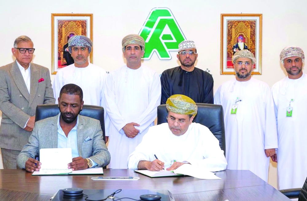 High-level representatives of Raysut Cement and Libya’s Energy and Mining Bank signing the MoU in Muscat