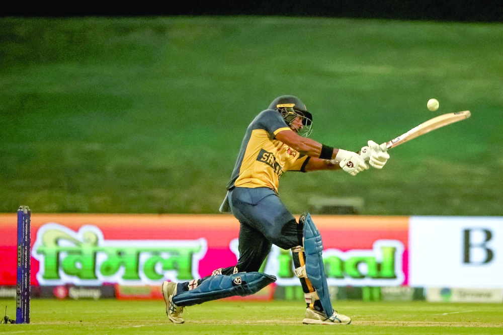 Sri Lanka's Kamindu Mendis plays a shot during the Asia Cup 2025 Super Four Twenty20 international cricket match between Pakistan and Sri Lanka at the Sheikh Zayed Cricket Stadium in Abu Dhabi. — AFP 