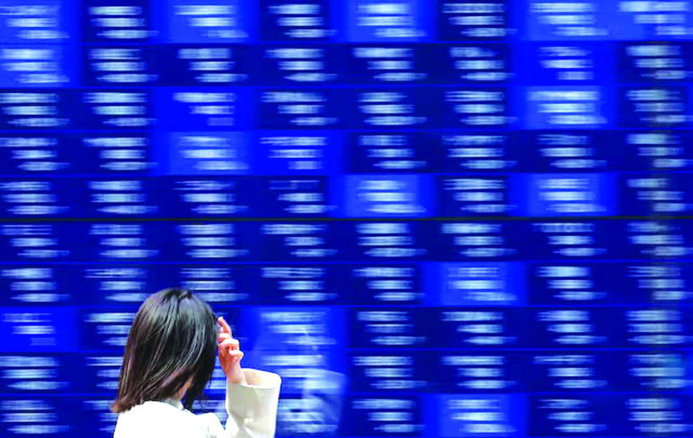 Overnight, Wall Street closed lower for a second straight session as investors booked profits. — Reuters