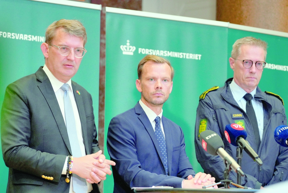 Denmark's Defence Minister Troels Lund Poulsen, Denmark's Minister of Justice Peter Hummelgaard and Denmark's National Police Chief Thorkild Fogde hold a press conference on the recent drone activities at several airports in Denmark, at the Ministry of Defence in Copenhagen. — AFP