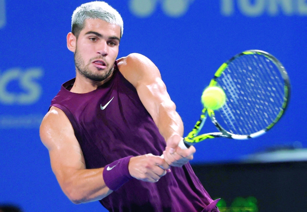 Spain's Carlos Alcaraz in action during his quarter final match against Brandon Nakashima of the US. — Reuters