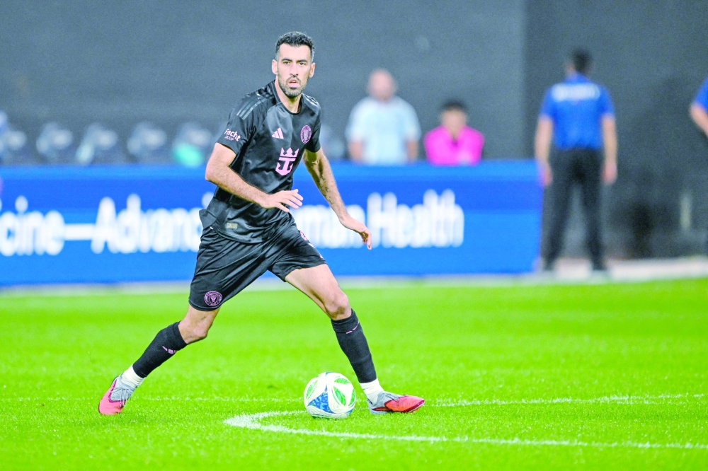 Inter Miami midfielder Sergio Busquets (5) controls the ball. — Imagn Images