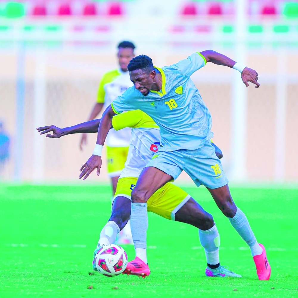 Al Khabourah and Ibri players fight for the ball