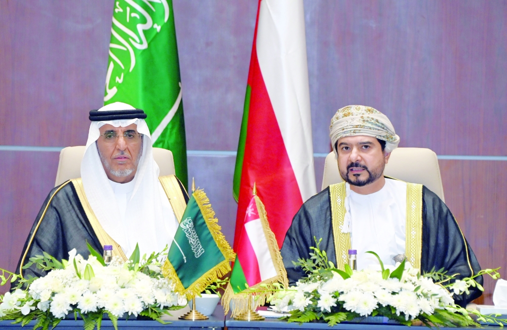 Qais Mohammed al Yousef and Dr Saad Othman al Qasabi at the meeting in Muscat on Tuesday. — ONA