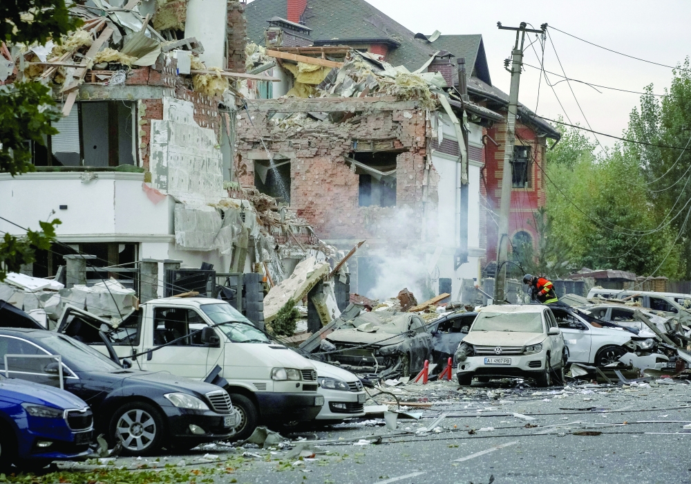 A view shows a residential neighbourhood hit during a Russian drone, in the outskirts of Kyiv. — Reuters