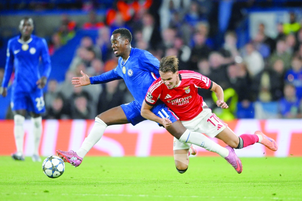 Chelsea's Jamie Gittens in action with Benfica's Amar Dedic. — Reuters