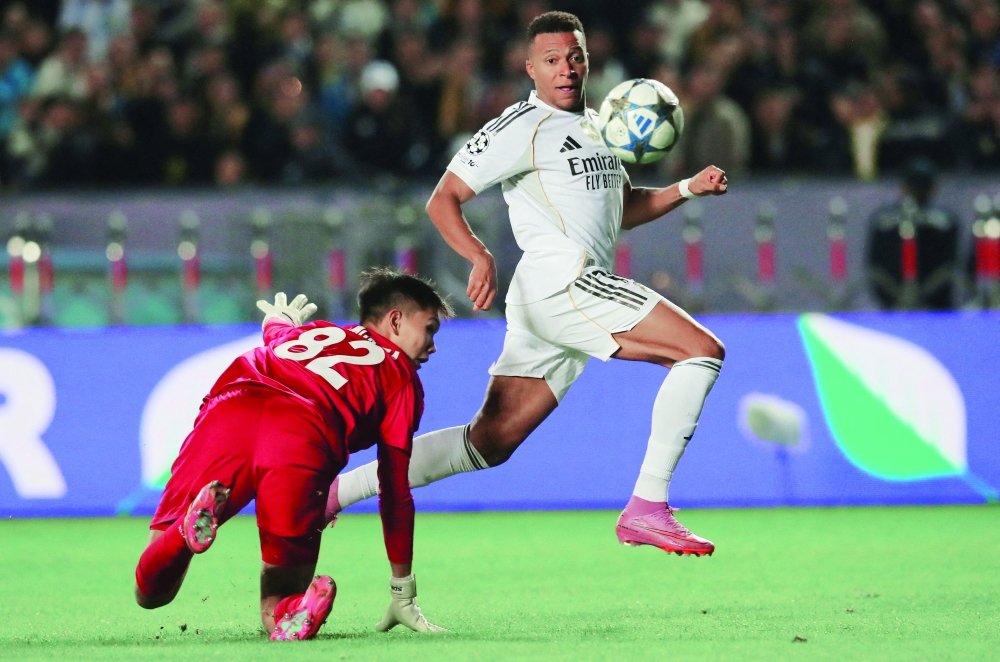 Real Madrid's Kylian Mbappe scores their second goal. — Reuters