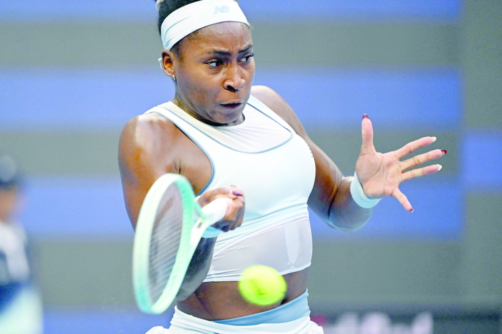 USA's Coco Gauff hits a return to Germany's Eva Lys during their women's singles quarter-final match at the China Open tennis tournament in Beijing on October 2, 2025. (Photo by GREG BAKER / AFP)
